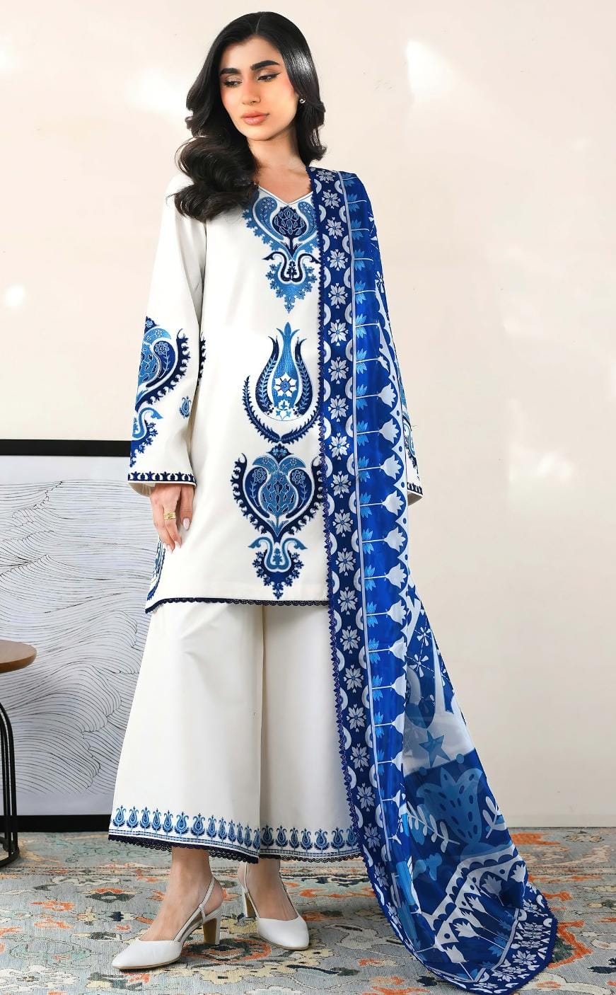 Ethnic article 2250. White with blue ornamental motifs and a coordinating blue dupatta.